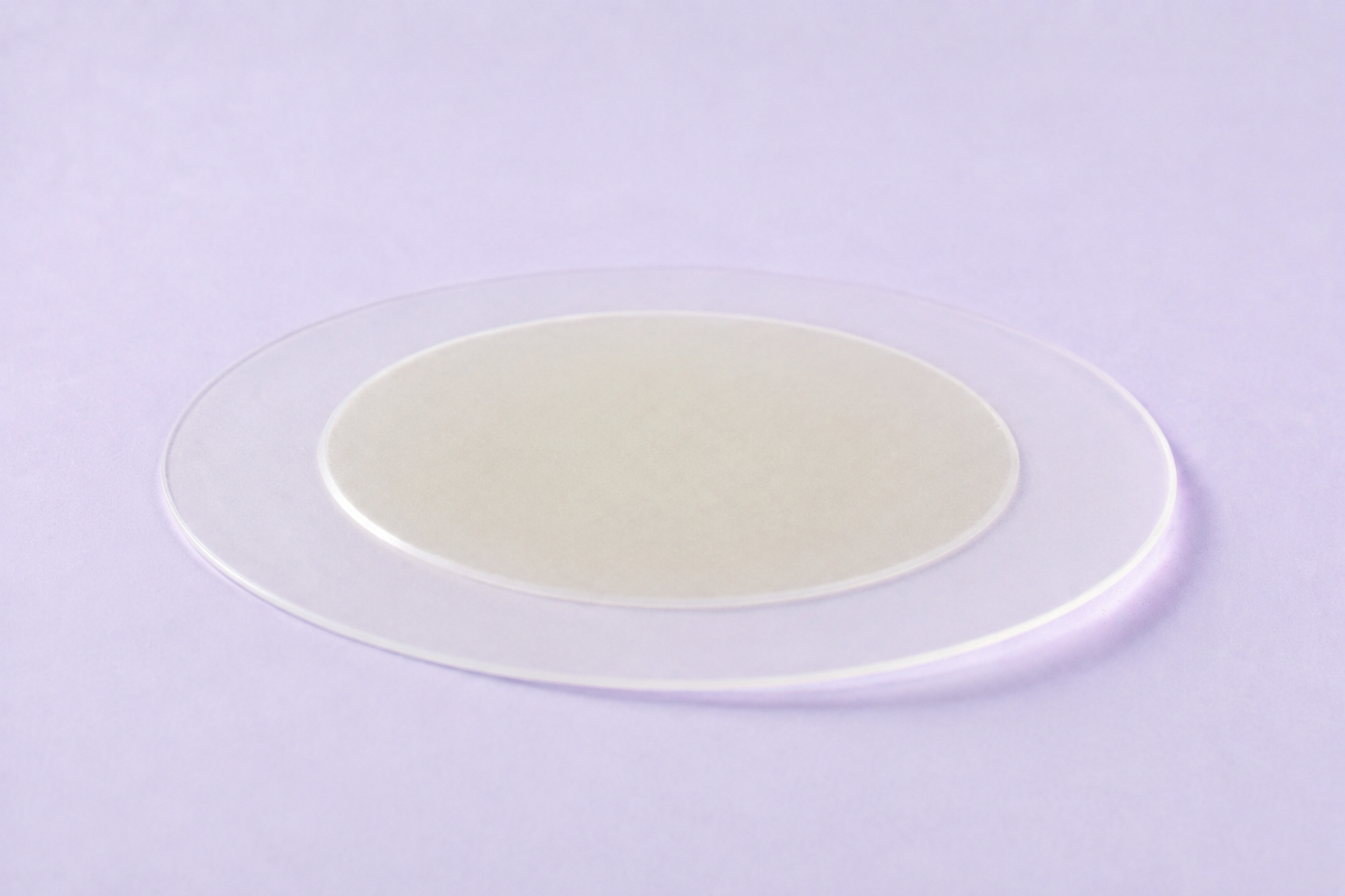 Rendu 3D réaliste d’un patch hydrocolloïde dont le rebord aminci représente 25 % du rayon